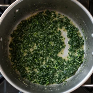 Spinach simmering with vegetable stock