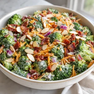 Broccoli salad topped with sliced almonds