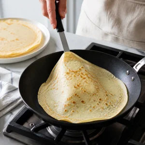 Chocolate-Filled Rolled Crêpes with Cocoa Dust