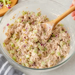 Creamy tuna salad stirred until evenly coated with dressing