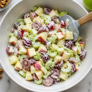 Grapes and celery folded into dressed apples