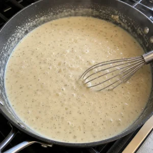 Creamy sauce simmering in a skillet