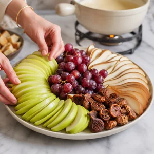 Elegant Swiss Cheese Fondue with Fresh Orchard Fruits