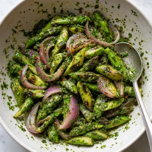 Grilled asparagus and red onions tossed with chimichurri