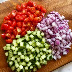 Chopped tomatoes, cucumbers, and red onion