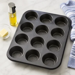 Greased muffin tin ready for keto egg muffins