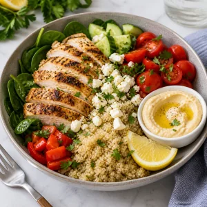 Finished chicken veggie quinoa bowl ready to serve