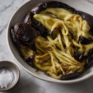 Roasted eggplant peeled and torn into smoky strips