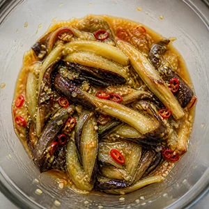 Warm smoky eggplant strips tossed in lime chile dressing