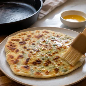 Hot cooked gozleme brushed with melted butter